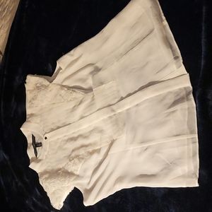 White sleeveless blouse